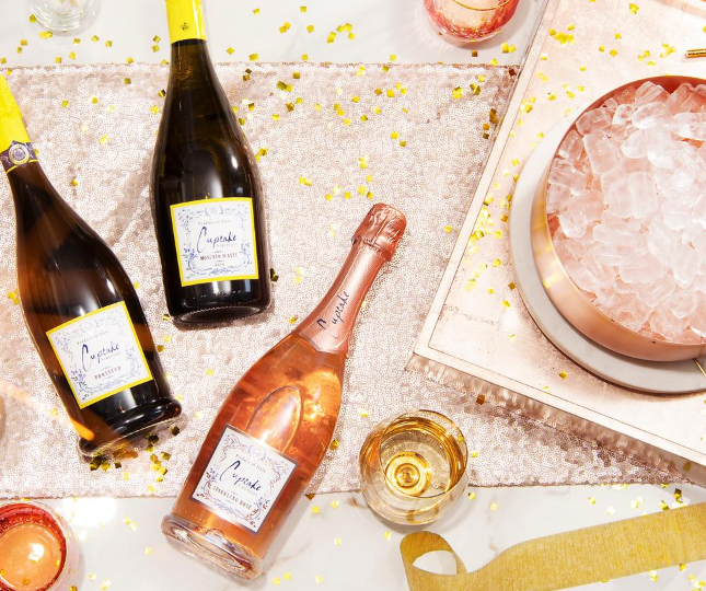 Cupcake sparkling wines laying on a table