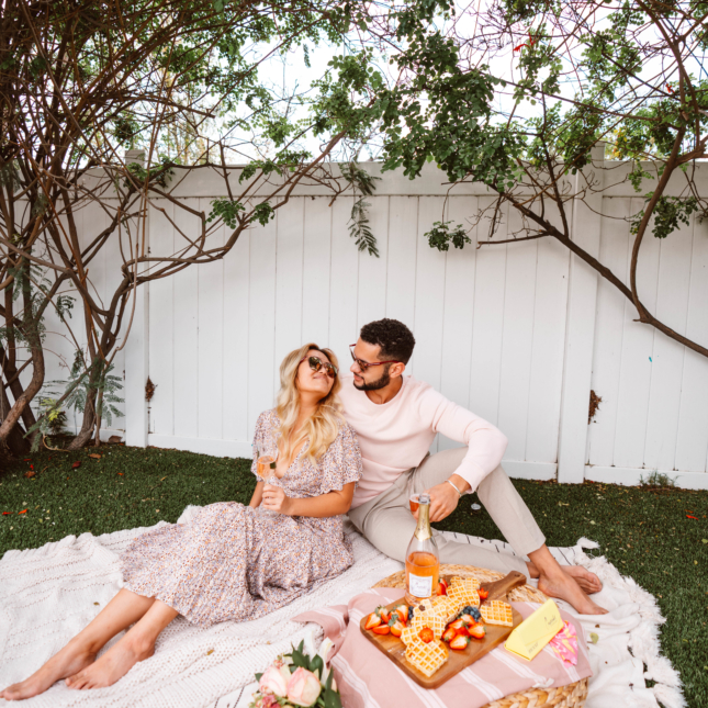 Couple shows off their new Cupcake x Zenni Prosecco Rose sunglasses at a picnic